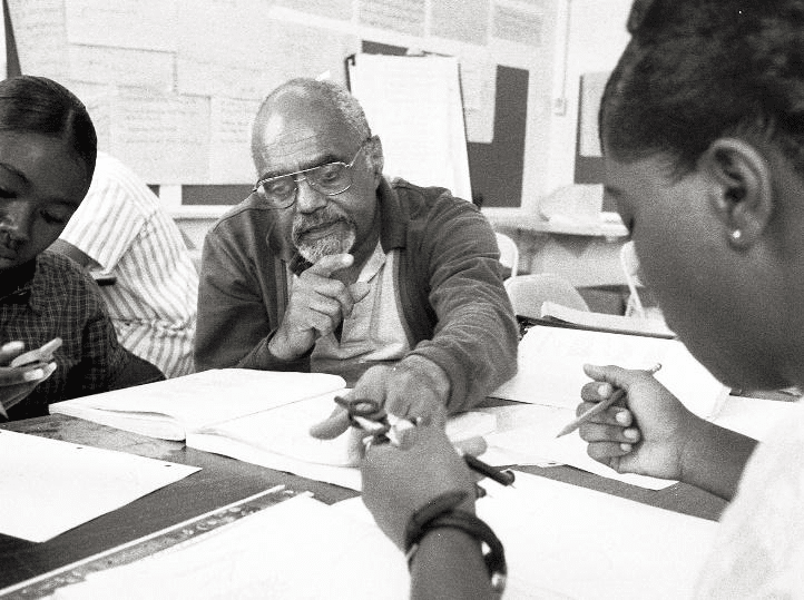 Robert Moses working with students